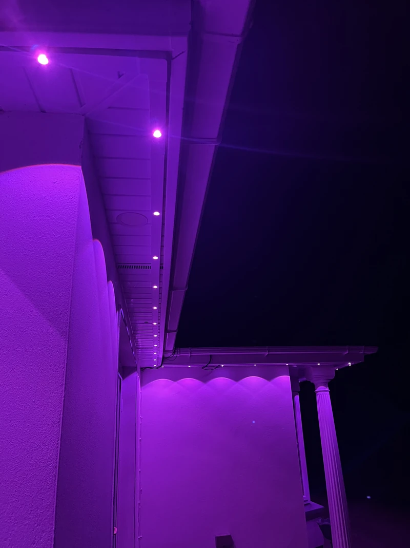 Our purple-lit custom PVC track, showing the long run and the roofline return